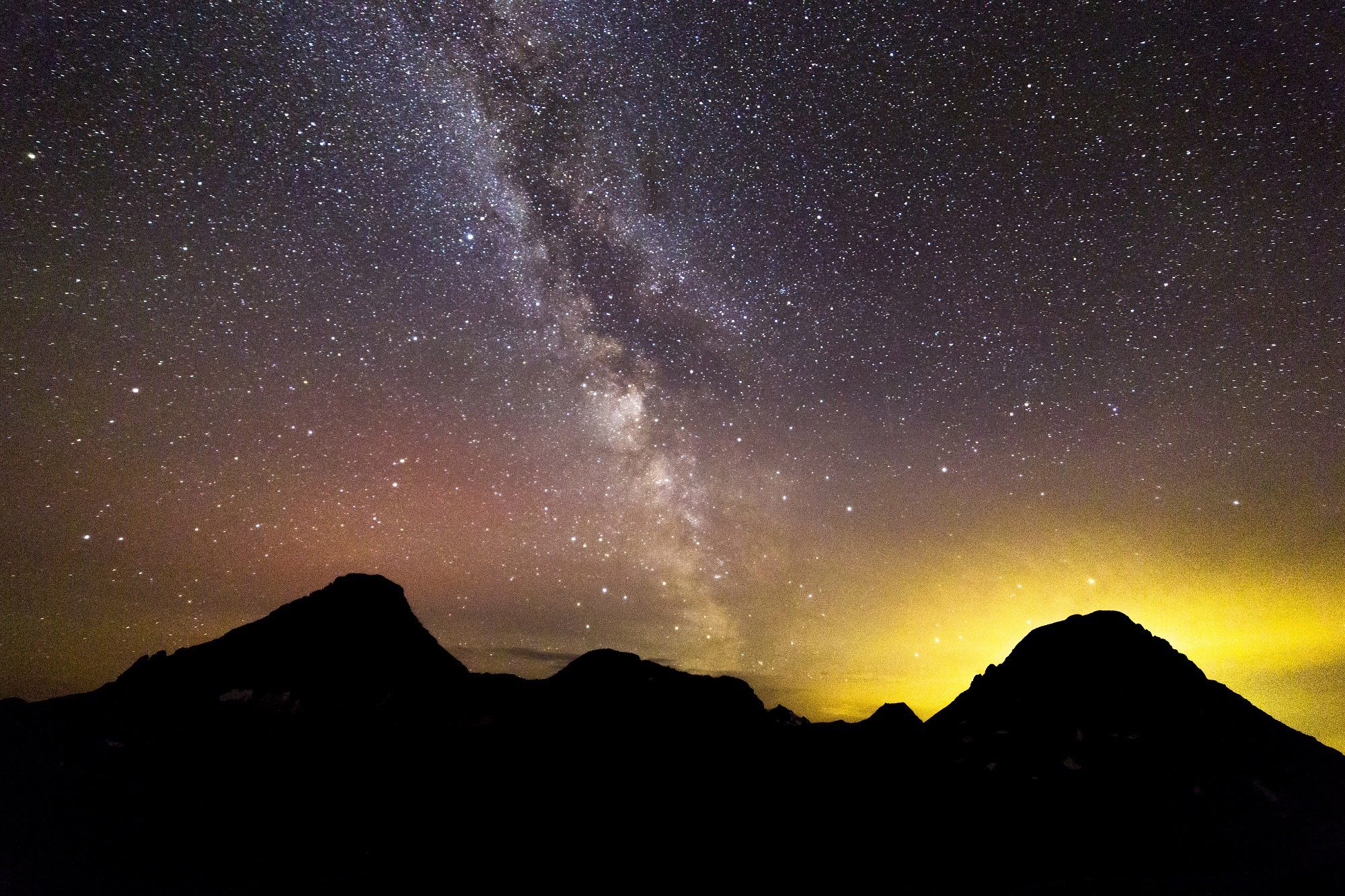 Milky way above the mountains at Glacier National Park, Montana